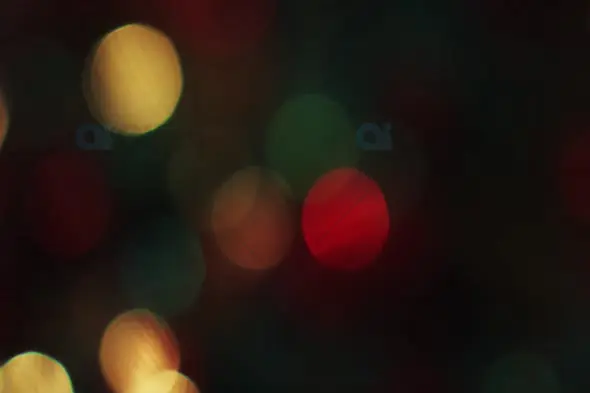 Warm Red and Green Bokeh Lights for Festive Motion Graphics