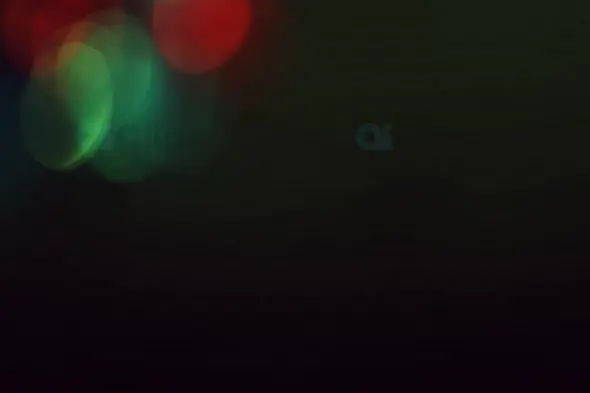 Minimalist Red and Green Bokeh Lights for Artistic Motion Graphics