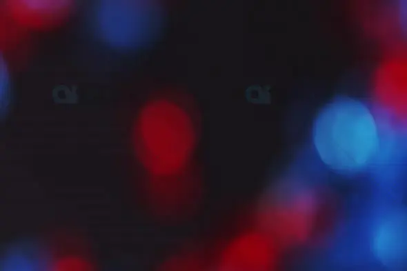 Red and Blue Bokeh Lights on Dark Background for Nightlife Motion Graphics