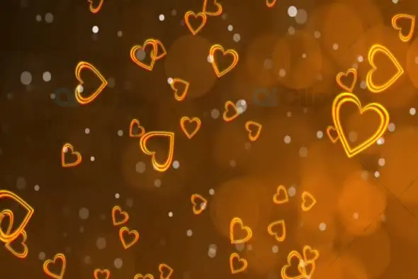Floating Glowing Hearts with Warm Golden Background Animation