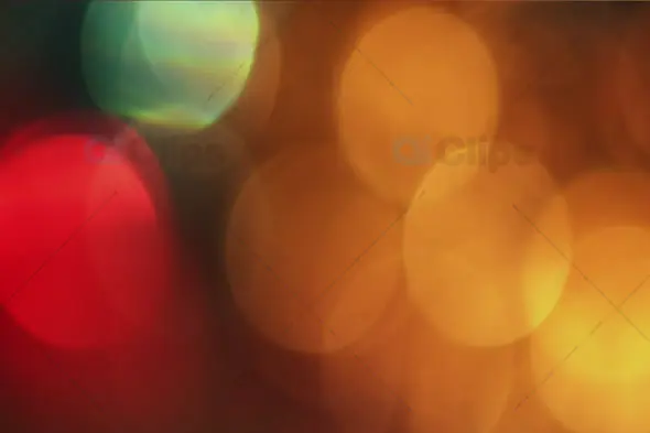 Festive Bokeh with Warm Yellow, Red, and Green Light Orbs
