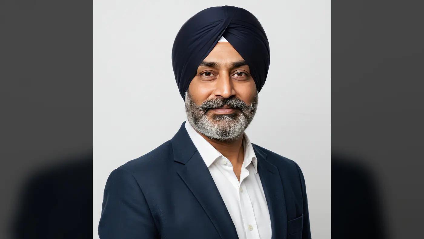 Confident Sikh Businessman Wearing Navy Blue Turban and Suit – Professional Portrait