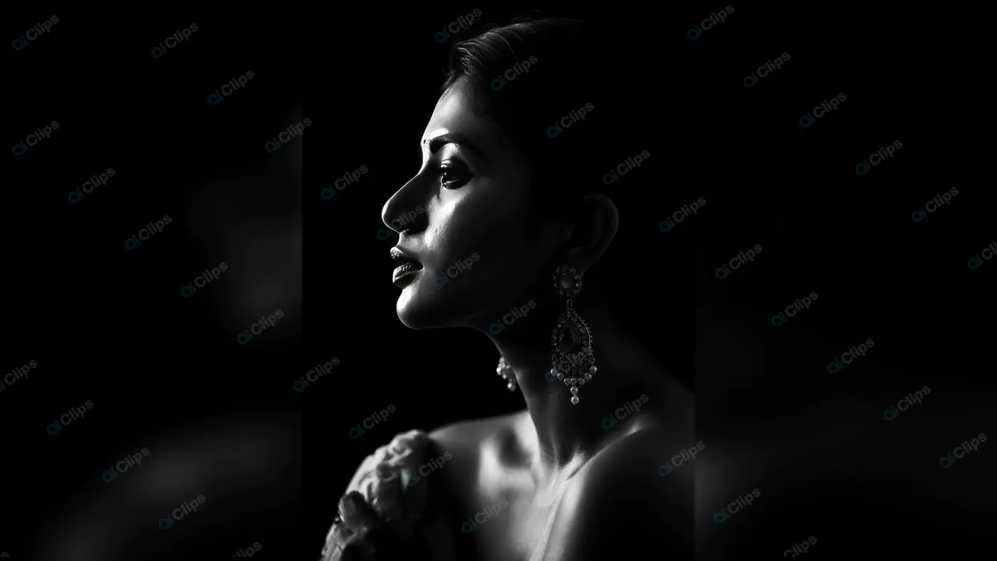 Elegant Indian Woman in Dramatic Black and White Portrait with Jewelry