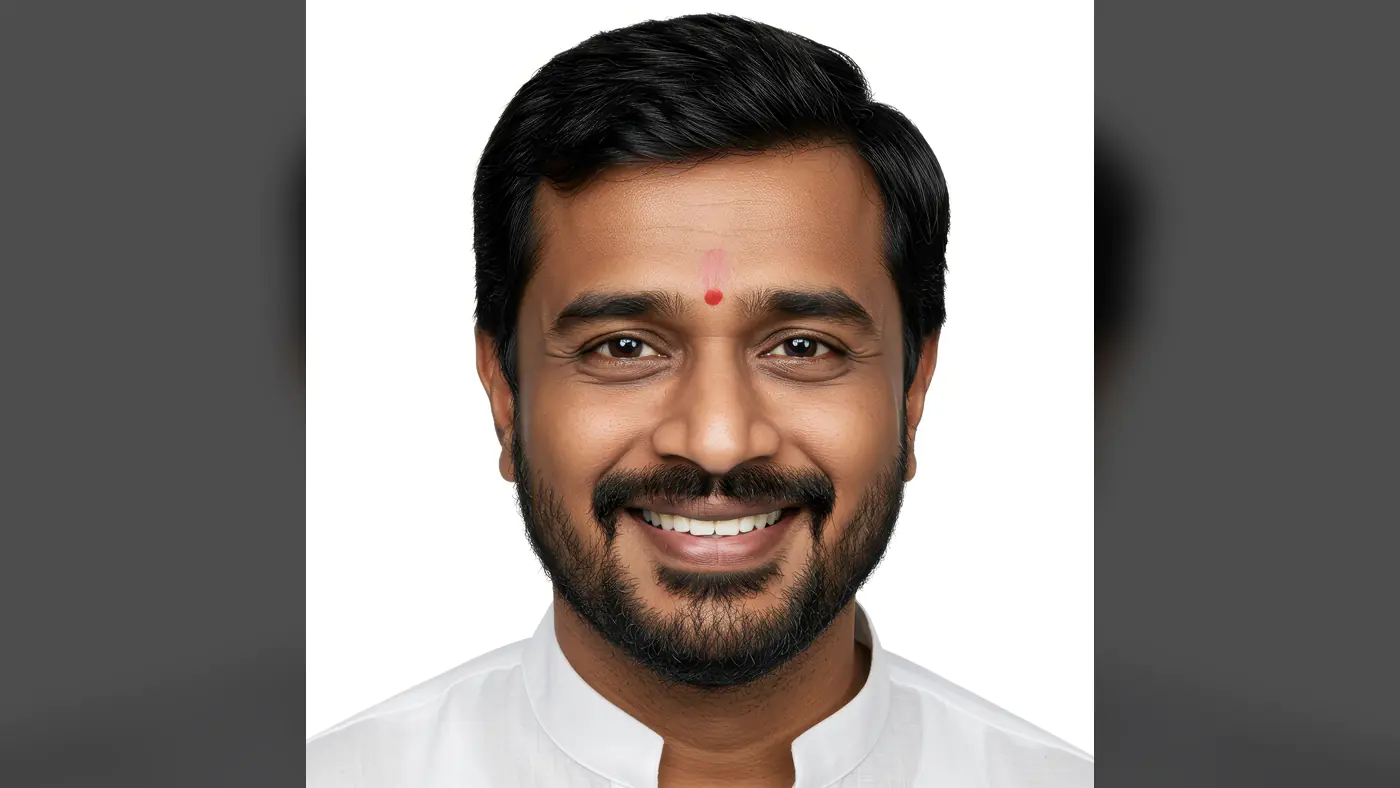 Smiling Indian Man in Traditional White Kurta with Tilak on Forehead – Close-Up Portrait