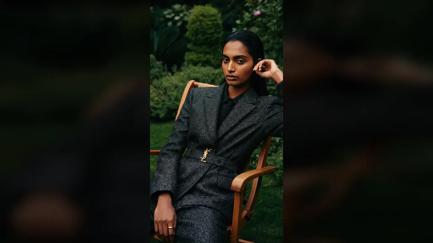 Confident Woman in Designer Suit Posing in Garden