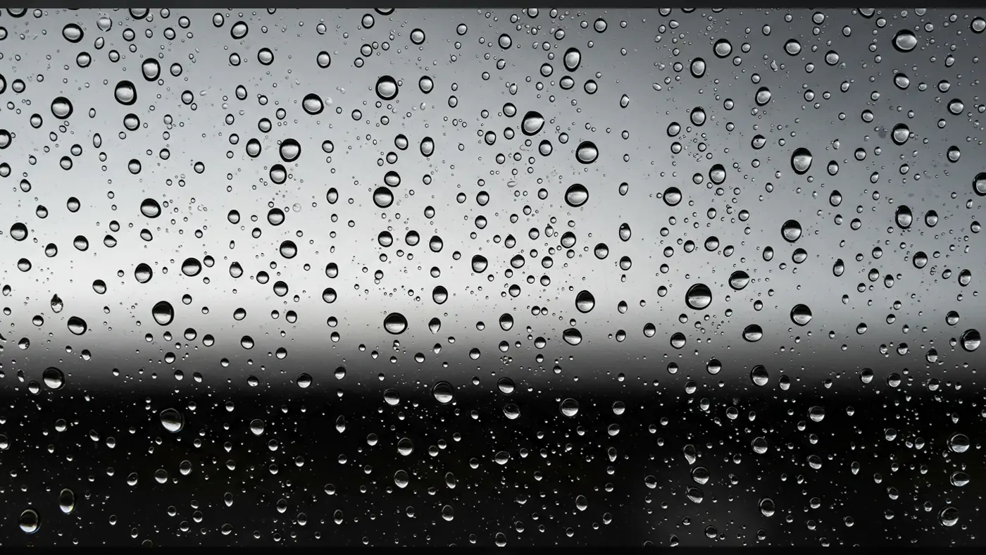 Realistic Rain Drops on Window Glass Texture Background