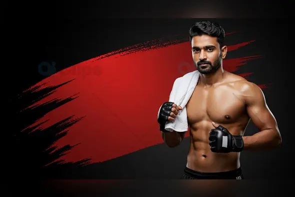 Fit Indian Male Athlete with Boxing Gloves and Towel