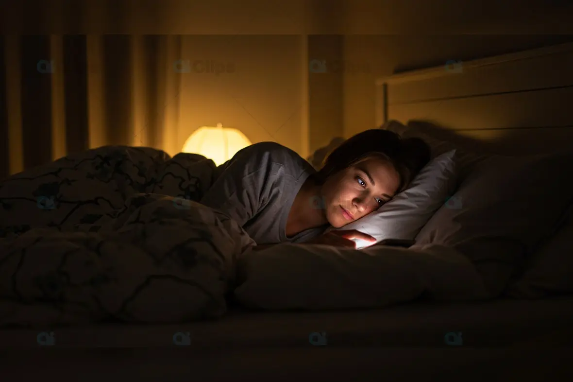 Late Night Phone Scrolling in Dimly Lit Bedroom