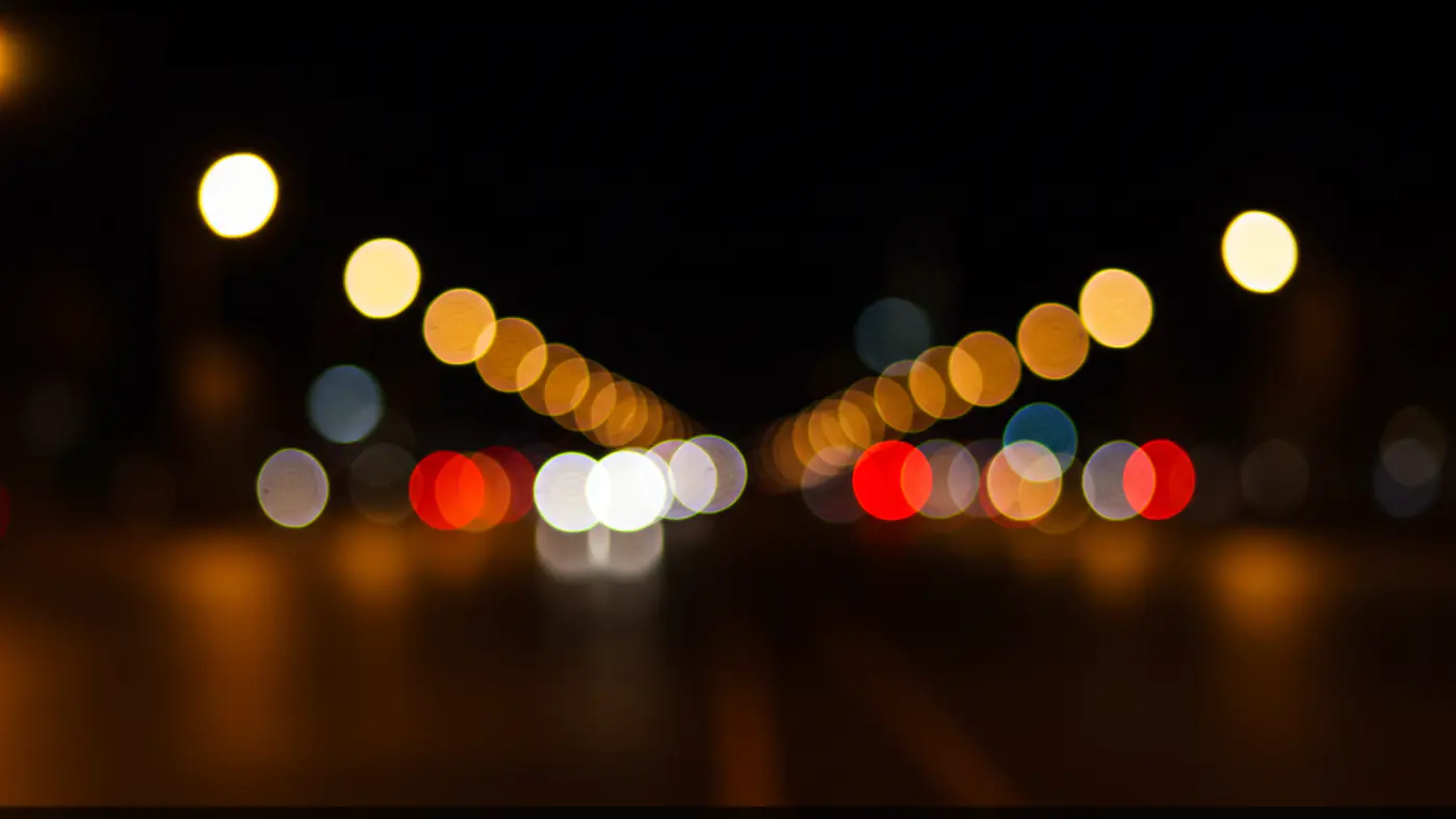 Defocused Street Lights at Night Urban Bokeh Texture Background