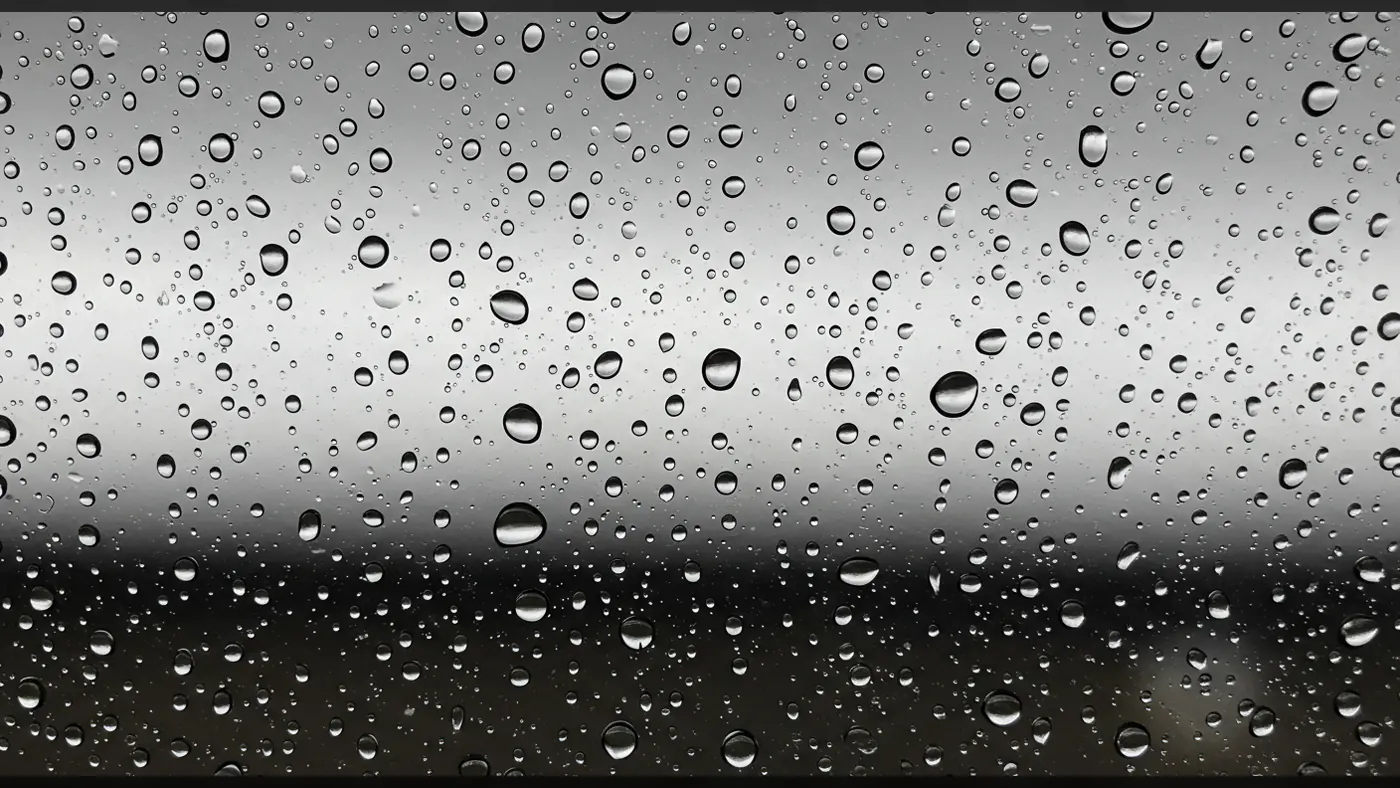 Close-Up Rain Drop Texture on Glass Window – Cloudy Mood Overlay