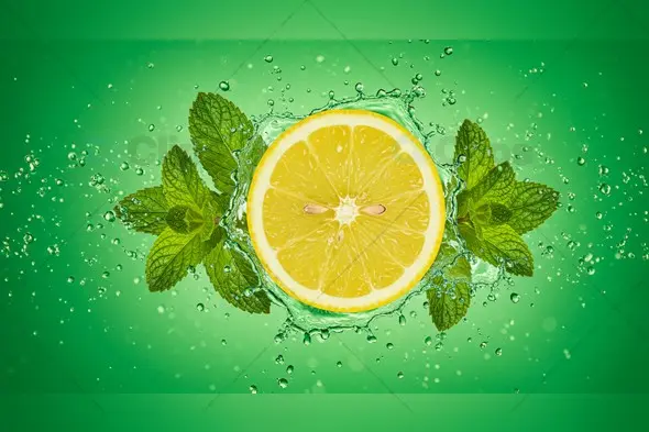 Vibrant Lemon Splash with Mint Leaves Stock Image