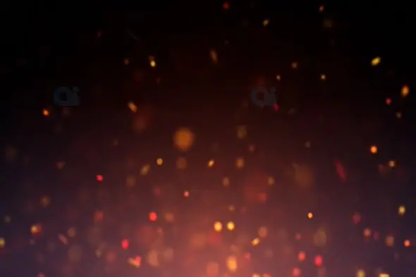 Glowing Ember Particles on Dark Background