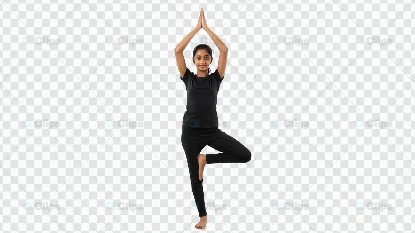 Young Yogi in Tree Pose with Raised Arms on White Background