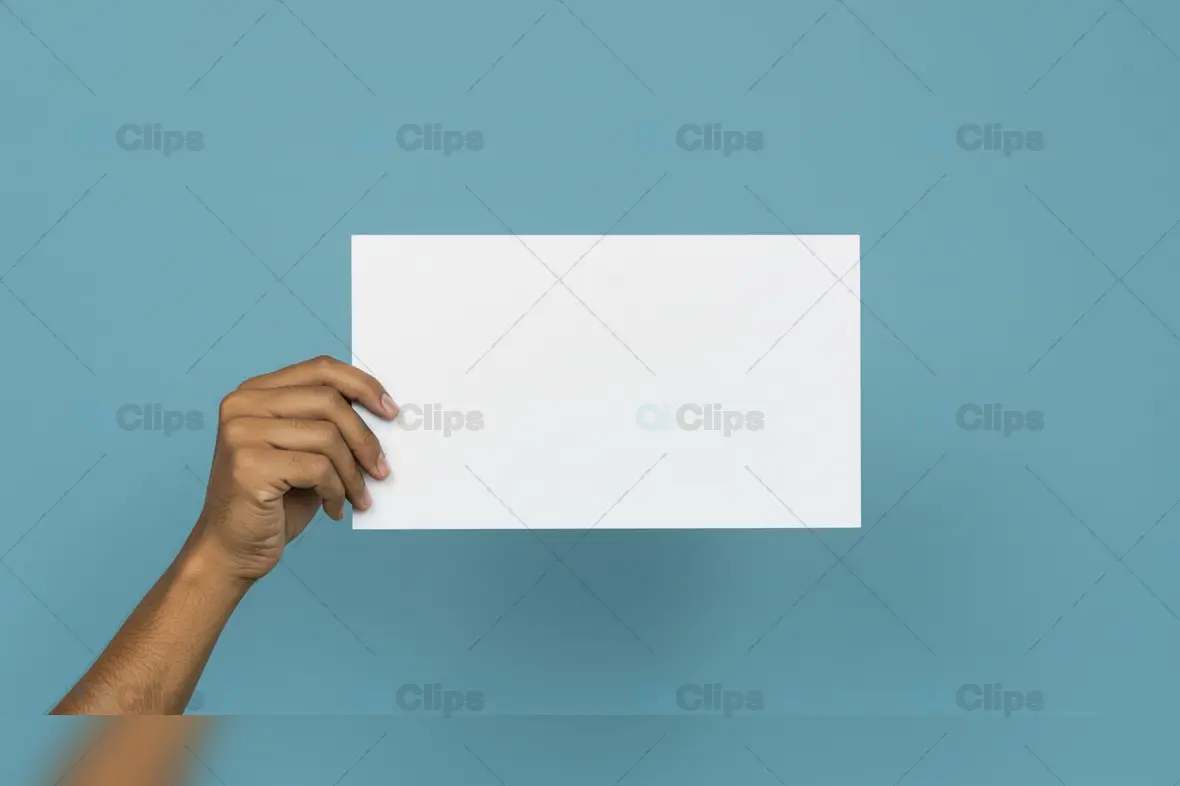 Hand Holding Blank White Card on Blue Background