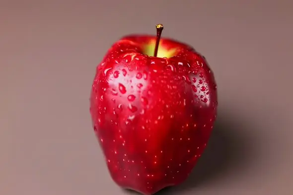 Fresh Red Apple with Water Droplets in Macro Shot