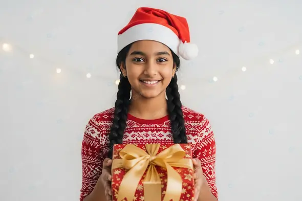 Cheerful Indian Girl with a Christmas Gift