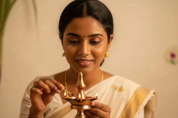 Graceful Woman Lighting a Traditional Brass Lamp
