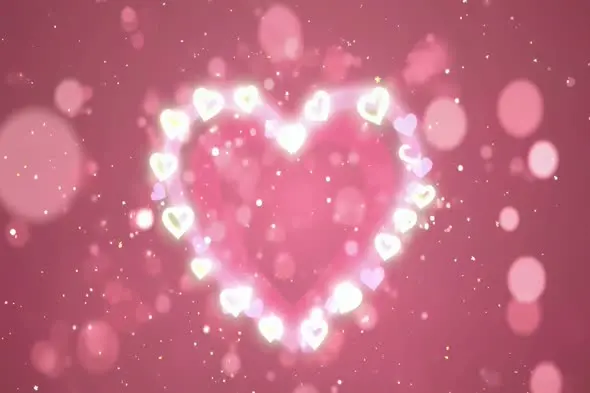 Glowing Heart Frame with Sparkling Bokeh Animation Background