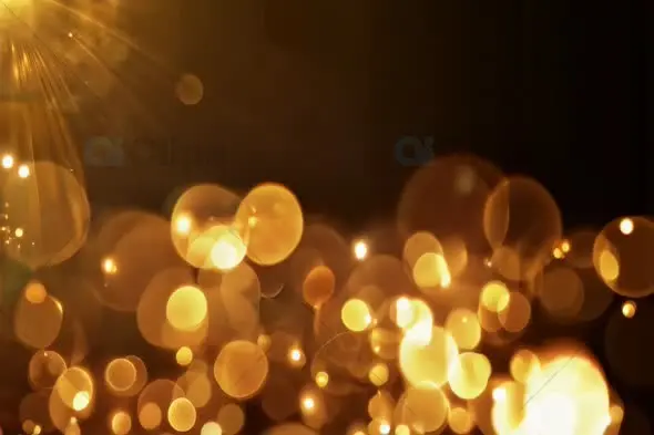 Golden Bokeh Light Particles with Sun Flare Effect