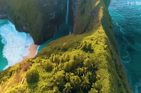 Aerial View of Tropical Coastal Cliffs with Hidden Beach