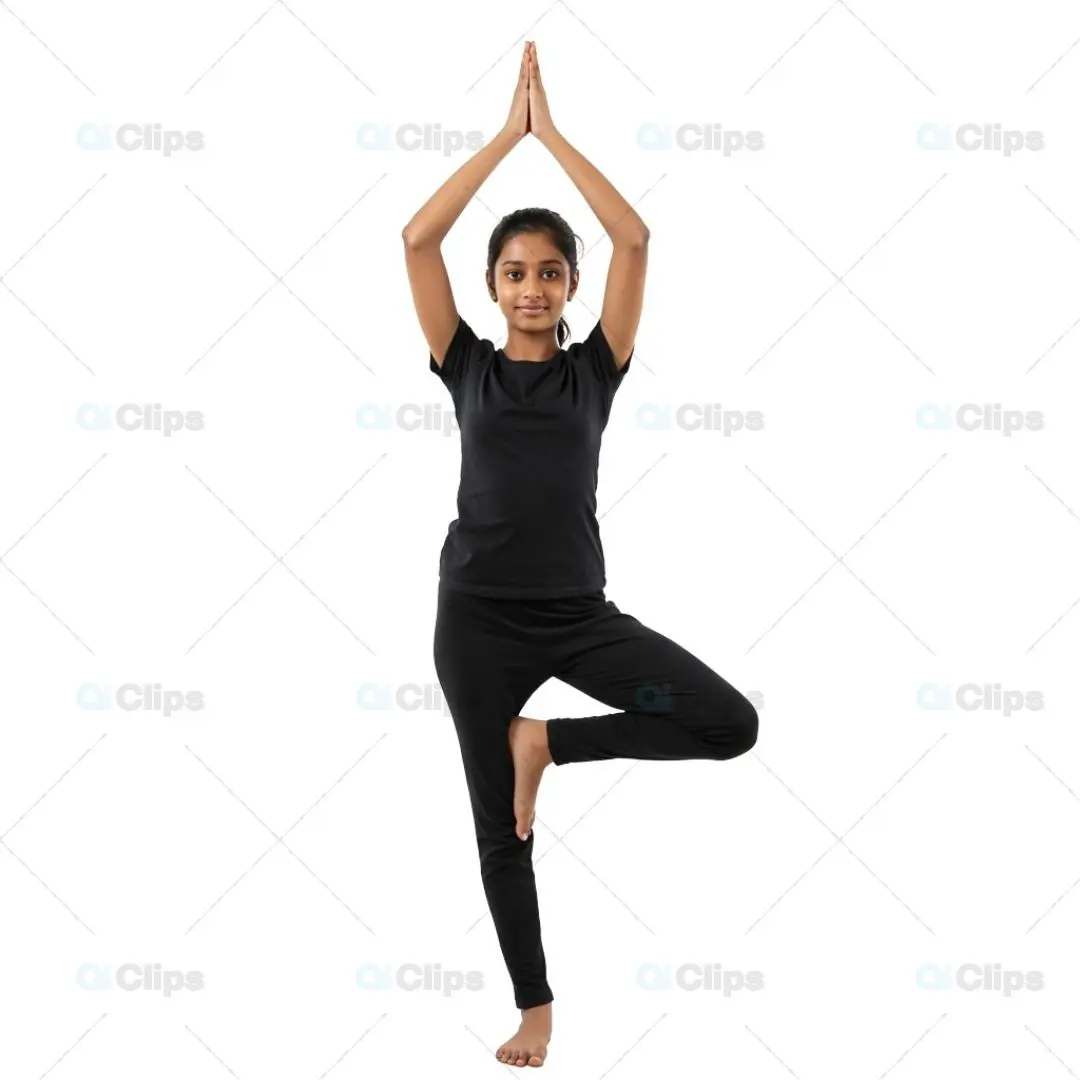Young Yogi in Tree Pose with Raised Arms on White Background