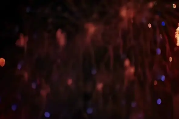 Abstract Bokeh Lights with Red and Purple Glow