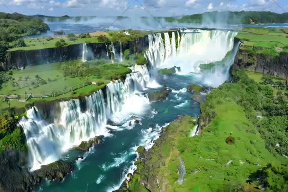 Majestic Iguazu Falls Aerial Panorama with Emerald Waters