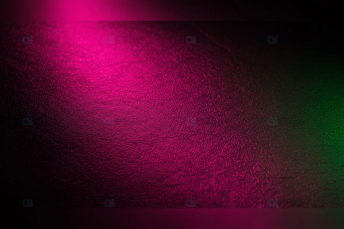 Textured Leather Background with Pink and Green Highlights