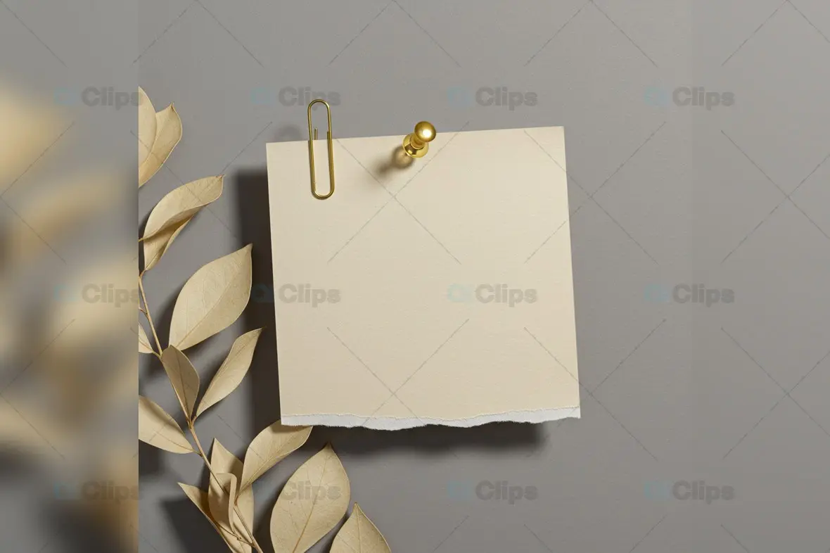Elegant Torn Note with Golden Pin and Botanical Elements