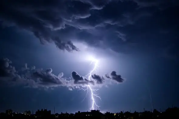Electrifying Thunderstorm Over City