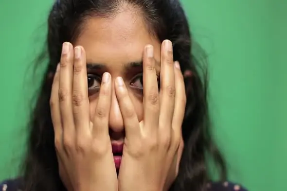 Peeking Through Fingers
