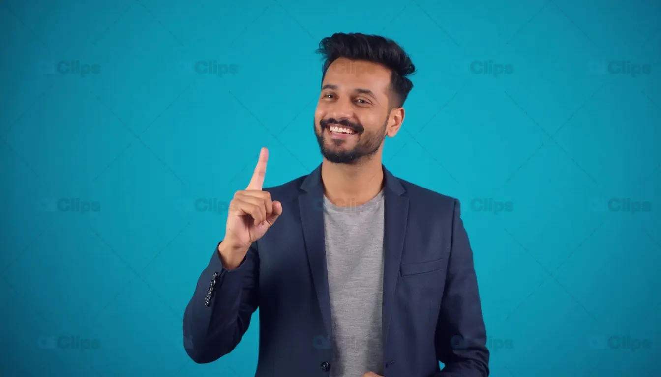 Smiling Man in Blazer Pointing Up
