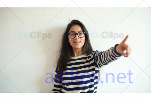 Woman Pointing and Smiling