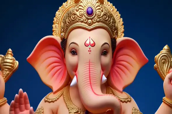 Intricate Lord Ganesha Statue Closeup Against Blue Background