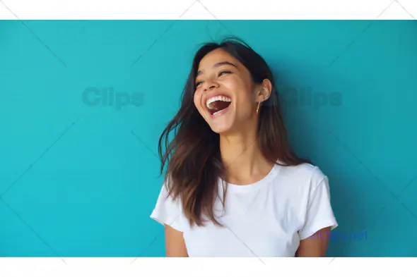Happy Woman Smiling Against Blue Background