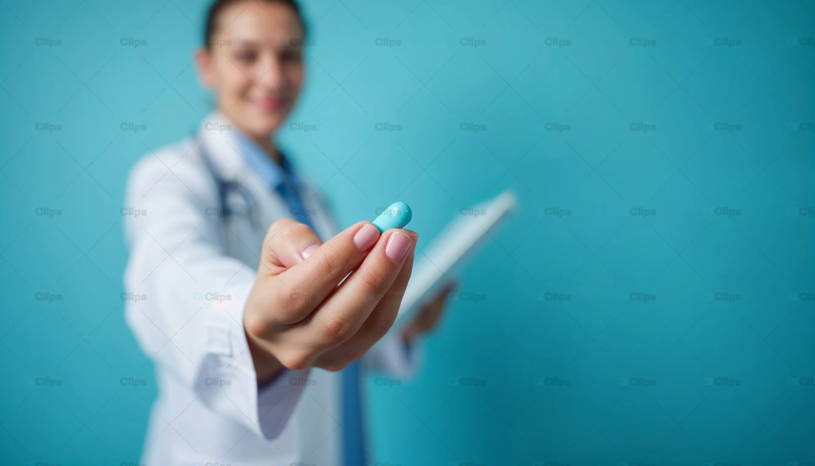Doctor Holding Blue Pill