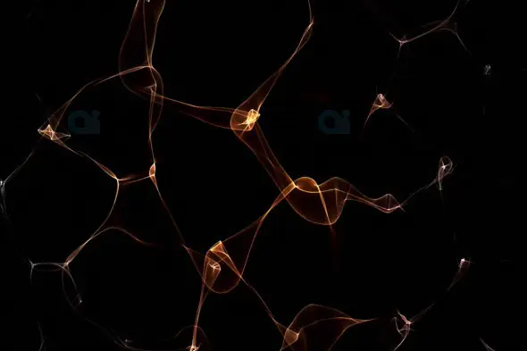 Abstract Flowing Golden Mesh on Dark Background