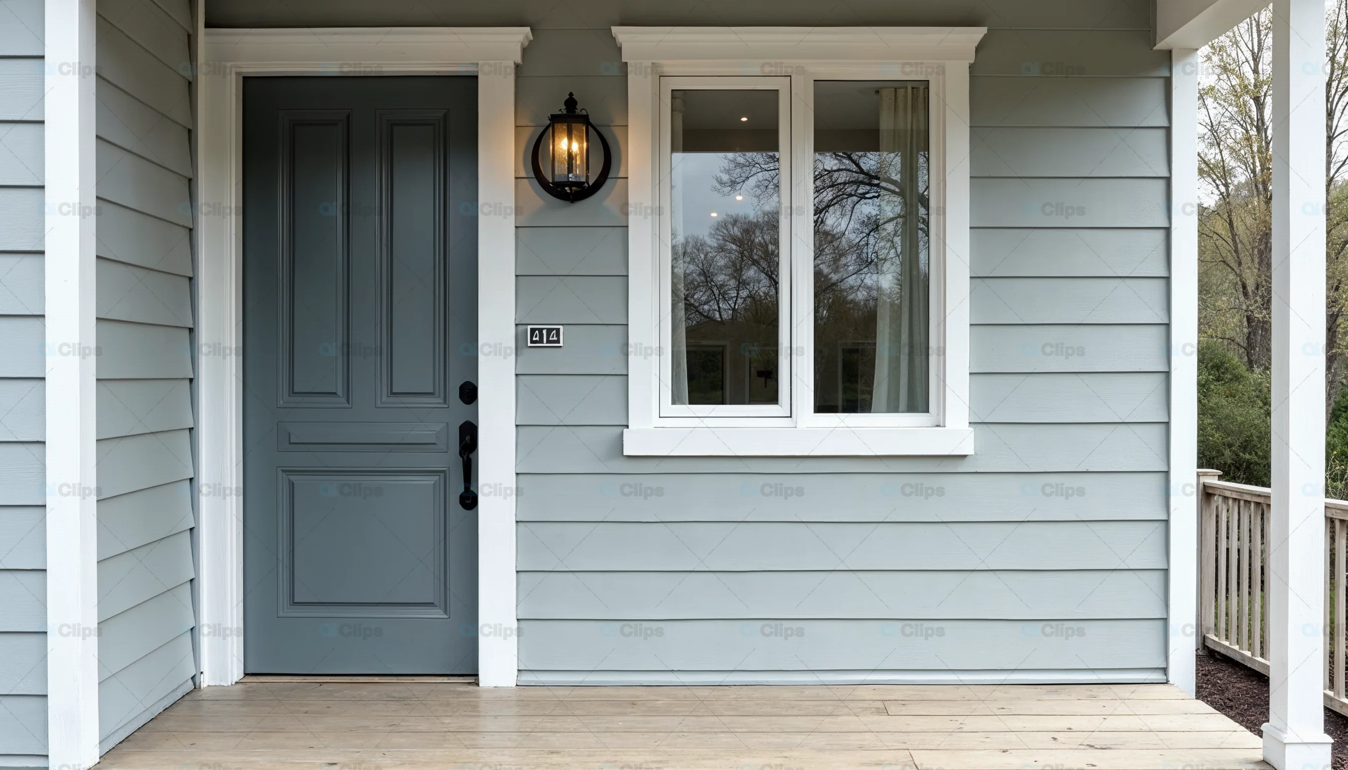 Front Porch with Blue Door and Siding