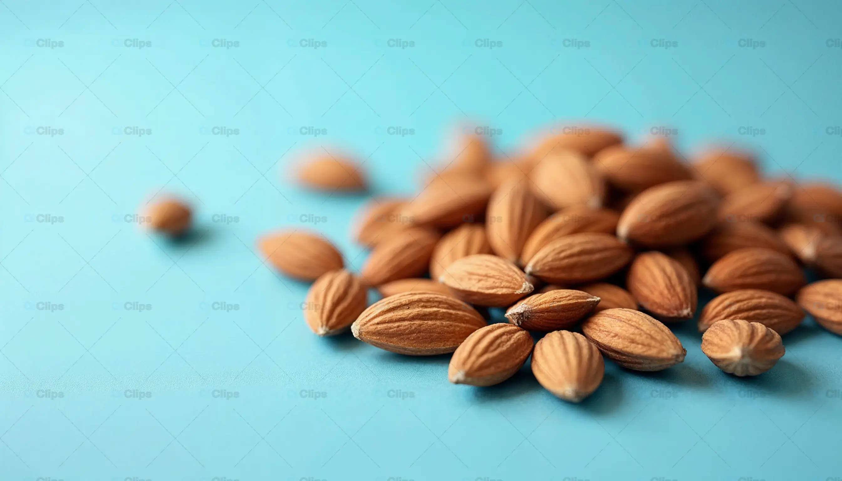 Almonds on Blue Background