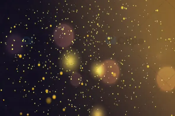 Golden Bokeh Light Particles Floating on Dark Background