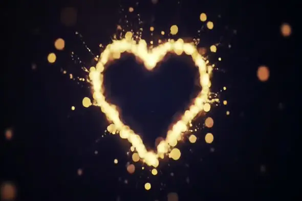Glowing Heart Sparkle Animation on Dark Background