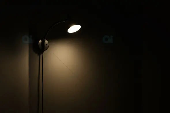 Wall-Mounted Reading Lamp Mockup with Warm Glow