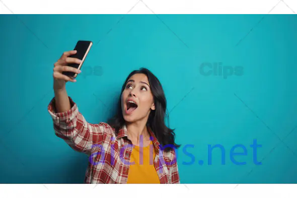 Excited Woman Taking Selfie