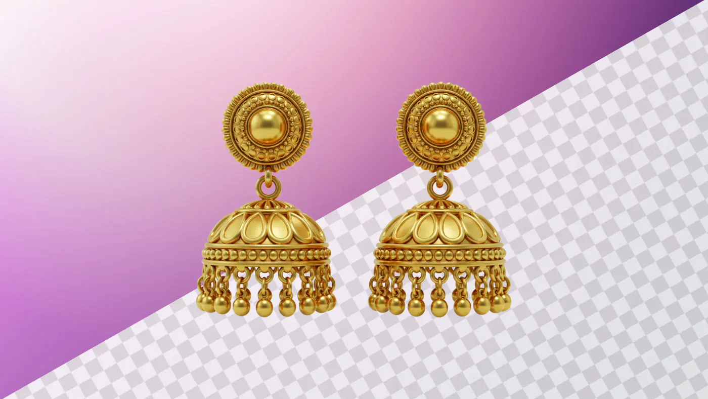 Golden jhumka earrings with intricate traditional design