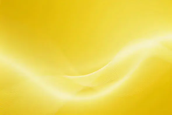 Silky golden waves flow across sunny background