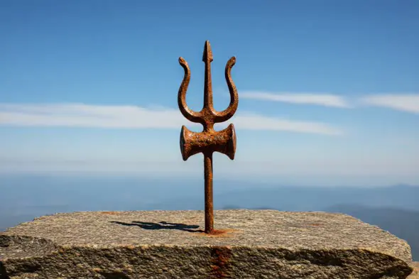 Sacred Trishul Planted on Mountain Cliff