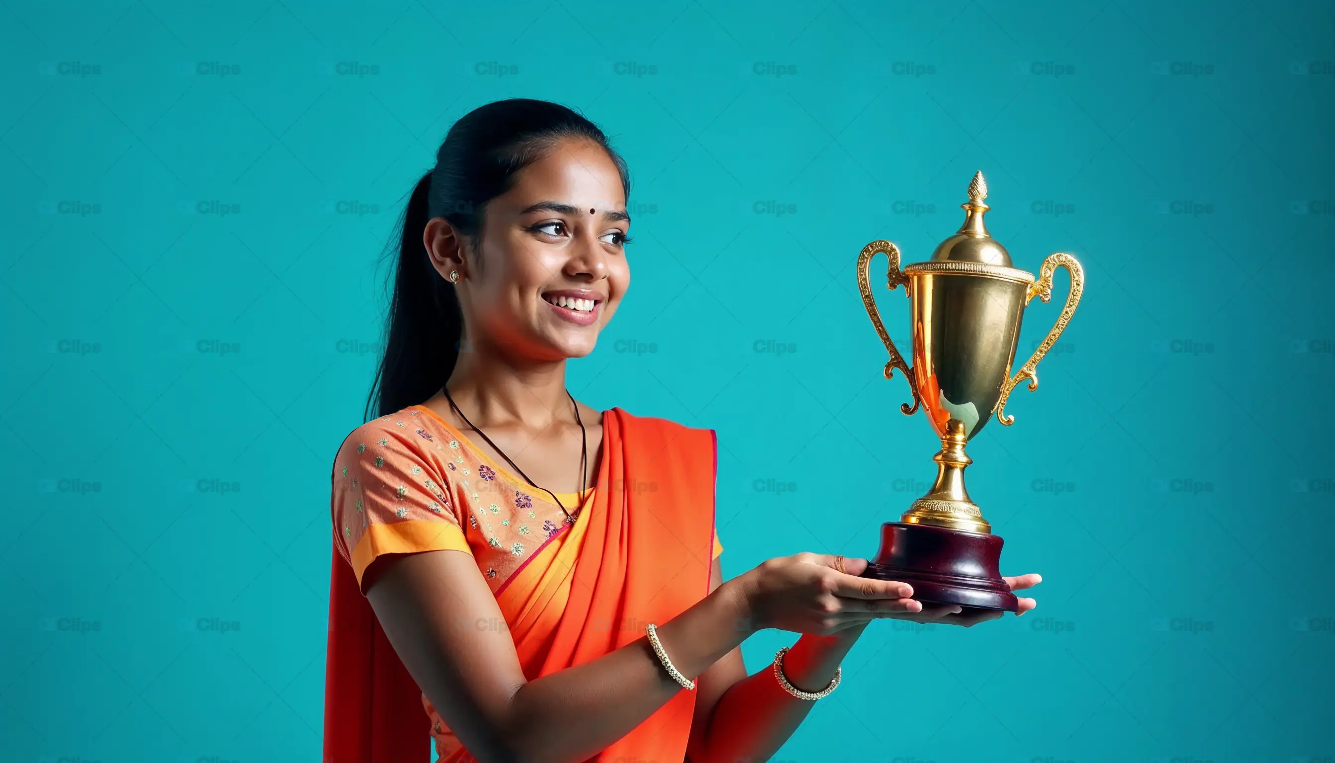 Smiling Girl Holding Trophy
