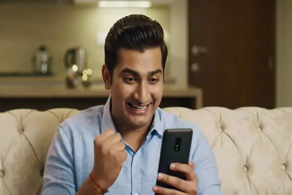 Jubilant Smartphone User's Victory