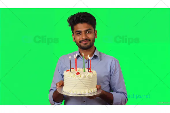 Man Holding Birthday Cake with Candles