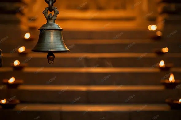 Ceremonial Bell in Candlelit Ambiance